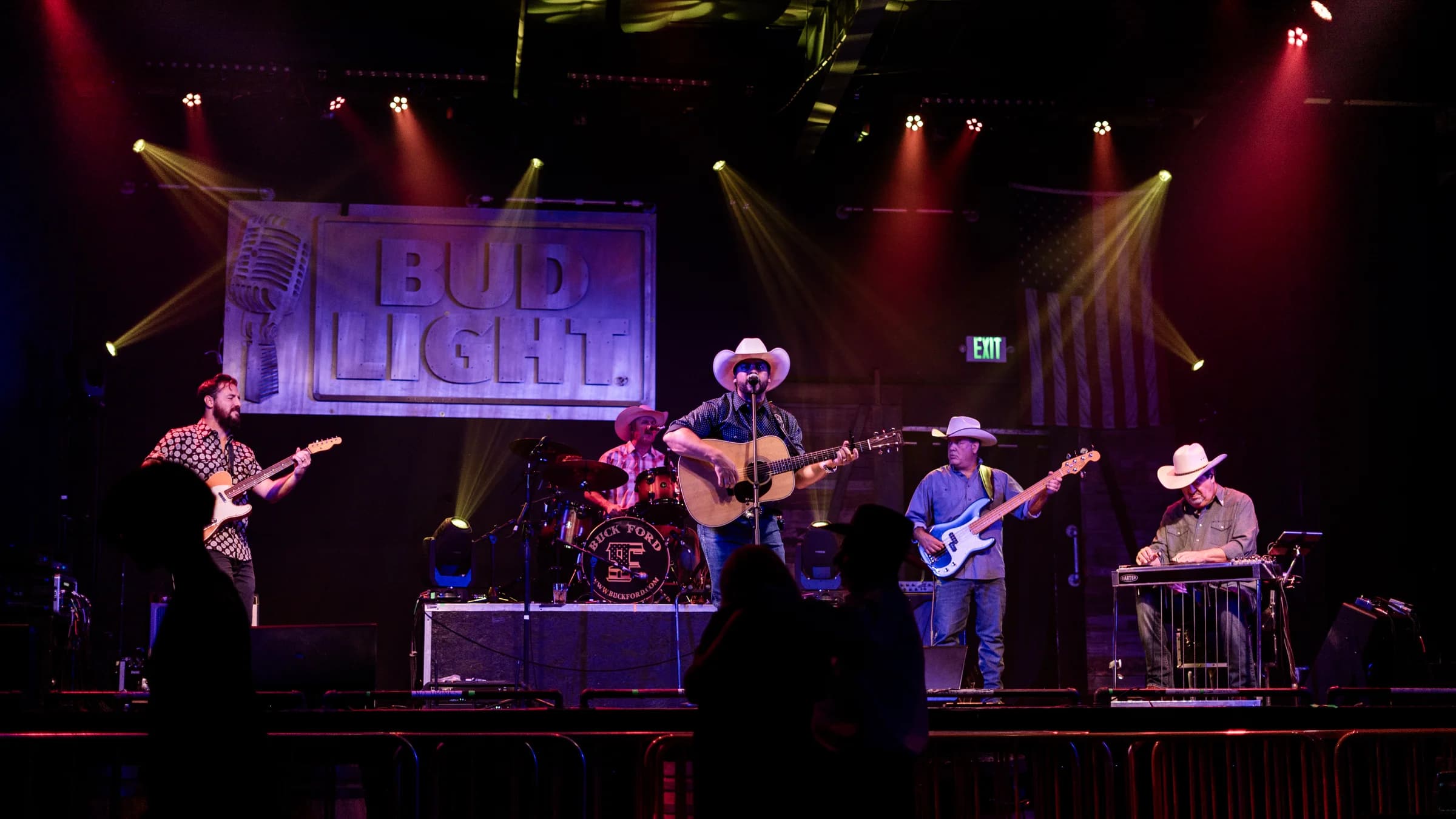 A wide view of Buck Ford and the band across the stage